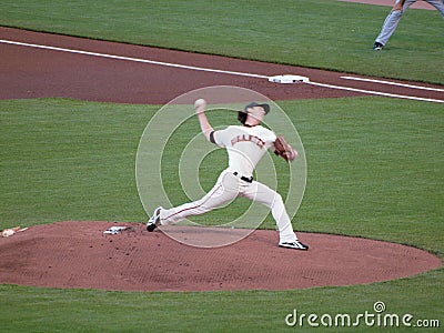 Giants two time Cy Young award winner Tim Lincecum steps forward to throw a pitch during a day game Editorial Stock Photo