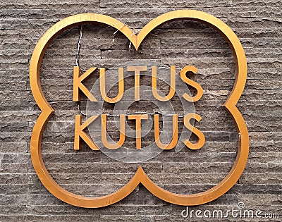 Kutus Kutus brand name on a rocky surface Editorial Stock Photo