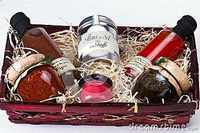 Gift basket with gourmet condiments and sauces. Stock Photo