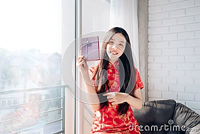 Gift box of Asian Woman Chinese dress,Qipao,Cheongsam Stock Photo
