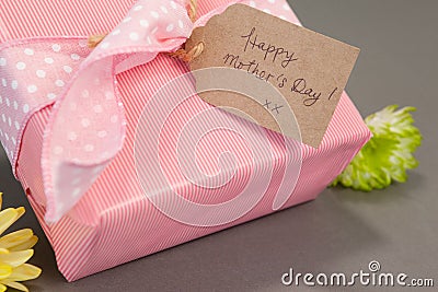 Gift box with happy mothers day card and flowers Stock Photo