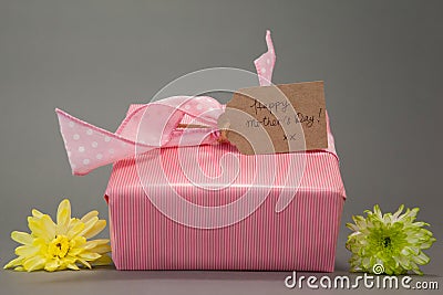 Gift box with happy mothers day card and flowers Stock Photo