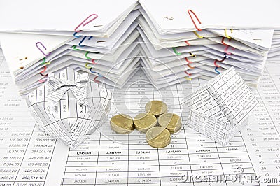 Gift box pile gold coin and house Stock Photo