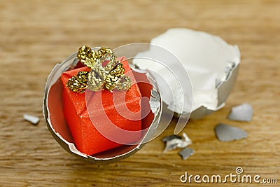Gift box surprise concept, open egg shells symbol of born Stock Photo