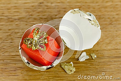 Gift box surprise concept, open egg shells symbol of born Stock Photo