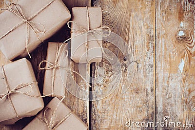 Gift boxes, postal parcels on wooden board Stock Photo