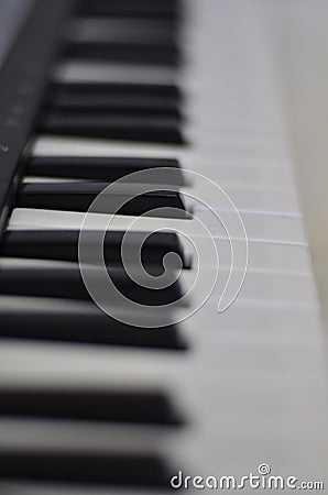 Gift close-up on synth keys with a soft blurred background Stock Photo