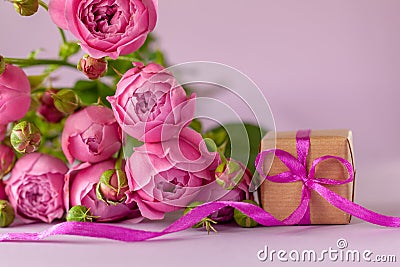 Gift present box with beautiful pink flowers roses bouquet. Concept Mother`s Day, Happy Birthday Stock Photo
