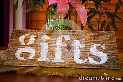Gift Table Sign and Flowers Stock Photo