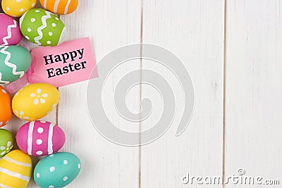 Gift tag with Easter egg side border against white wood Stock Photo