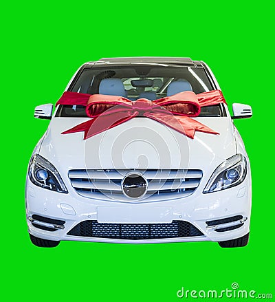 Gift Wrapped Motor Vehicle isolated on green Stock Photo