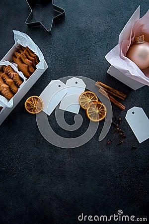 Gift wrapping of Christmas gingerbread cookies. Stock Photo
