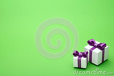 Gifts for the holidays on a green background Stock Photo