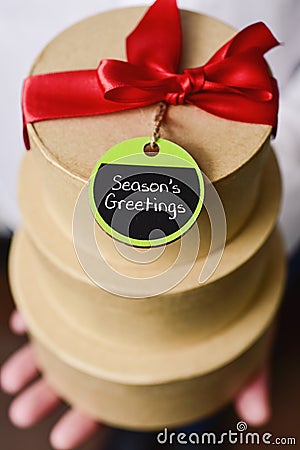 Gifts and text seasons greetings Stock Photo