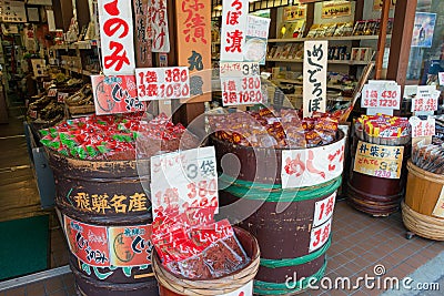 Shop sells Japanese sweets and food in colorful bamboo baskets atTakayama Old Town in Takayama, Gifu, Japan Editorial Stock Photo