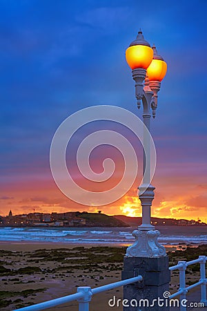 Gijon skyline sunset in San Lorenzo beach Asturias Stock Photo