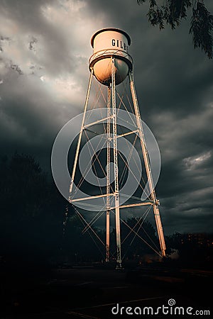 Gilbert water tower as a monsoon storm approcahes, gloomy mood, vertical Editorial Stock Photo