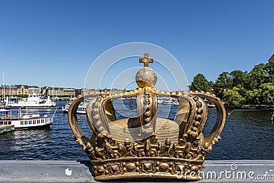 Gilded crown on the Skeppsholmsbron bridge in Stockholm, Sweden Stock Photo