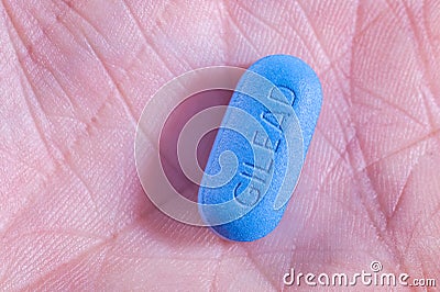 Gilead truvada pill in a hand Editorial Stock Photo