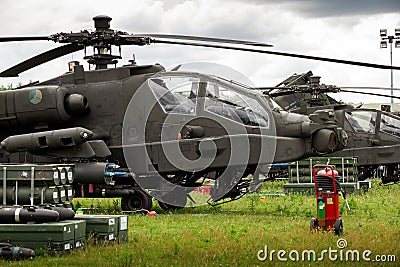 GILZE-RIJEN, NETHERLANDS - JUN 20, 2014: AH-64 Apache attack helicopter with rockets at the Royal Netherlands Air Force Days Editorial Stock Photo