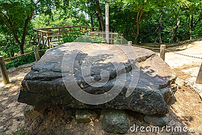 A Dolmen, bronze age tomb made of flat horizontal stone put over an underground burial chamber Editorial Stock Photo