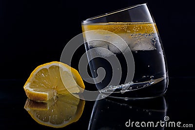 Gin and tonic with a slice of lemon Stock Photo
