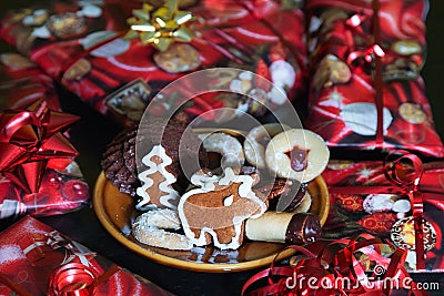 Ginger bread cookies and Christmas gifts. Stock Photo