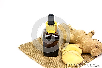 Ginger essential oil in bottle. Stock Photo