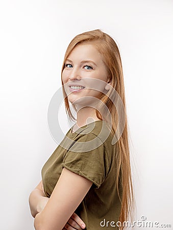 Ginger female with blue eyes posing to the camera Stock Photo