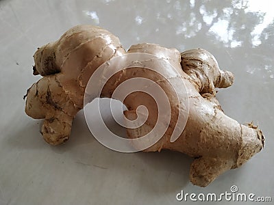 Ginger root on the floor Stock Photo