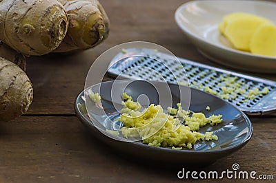 Ginger root , grated, close-up. Stock Photo