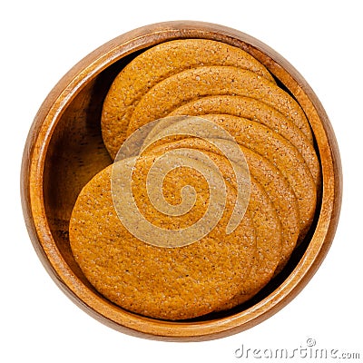 Ginger snaps, Scandinavian ginger nuts, in a wooden bowl Stock Photo