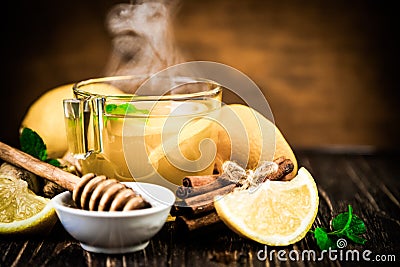 Ginger tea and ingredients - lemon, cinnamon, honey Stock Photo