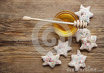 Gingerbread christmas cookies and bowl of honey Stock Photo