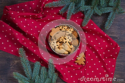 Gingerbread Christmas cookies in the iron box on red polka dot towel Stock Photo