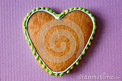 Gingerbread copy space. Baking heart close-up. Valentines day card. Pink background for the inscription. Place under text on cake Stock Photo