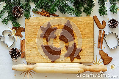 Gingerbread dough on a table with New Year`s decor. Stock Photo