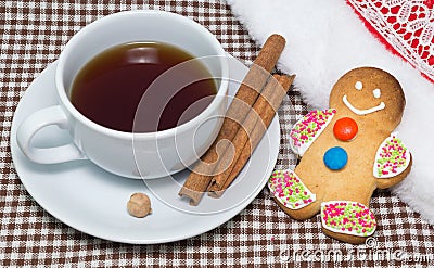 Gingerbread man with cup of hot tea Stock Photo