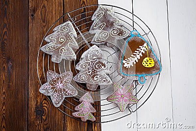 Gingerbread gingerbread on a mixed wooden background. Stock Photo