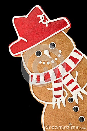 Gingerbread snowman on black Stock Photo