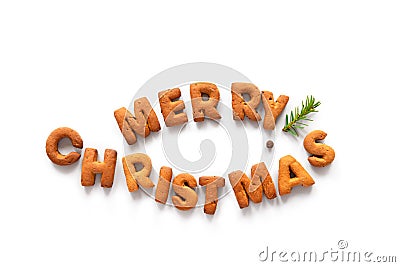 Gingerbread words Merry Christmas stacked in the shape of a fish as a symbol of Christianity Stock Photo