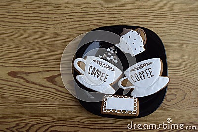 Gingerbreads in the form of cups with coffee, napkin and coffee pot. Stock Photo