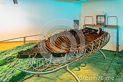GINOSAR, ISRAEL, SEPTEMBER 15, 2018: An ancient wooden boat found in Ginosar, Israel Editorial Stock Photo