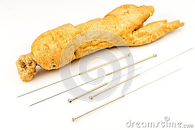 Ginseng root and acupunture needles Stock Photo