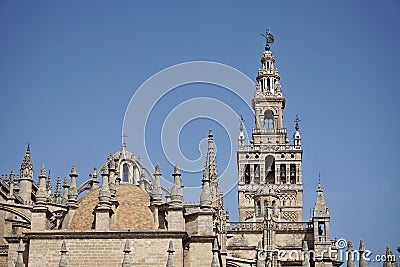 Giralda, famous bell tower of the Seville Cathedral in Spanish city of Sevilla, built as a minaret Stock Photo