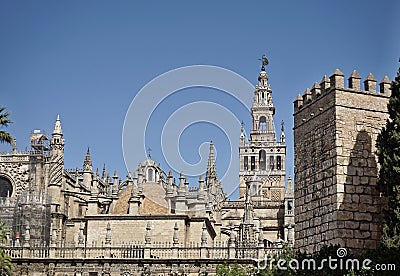 Giralda, famous bell tower of the Seville Cathedral in Spanish city of Sevilla, built as a minaret Stock Photo