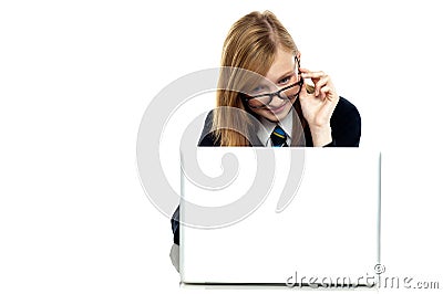 Girl adjusting her spectacles Stock Photo