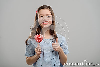 Girl adores sweets Stock Photo