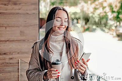 girl advertiser sets up advertising through a mobile application Stock Photo