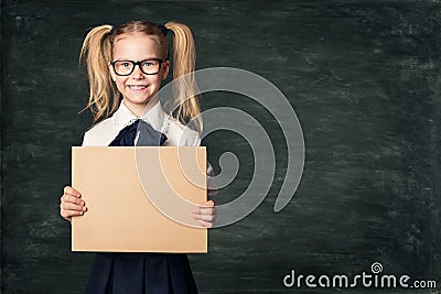 Girl Advertising Poster in School Classroom, Pupil Child in Glasses Hold Blank Board Advertisement Stock Photo